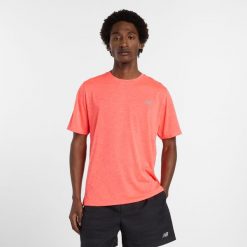 Koszulka męska New Balance MT41253URR – pomarańczowa. Brązowe t-shirty sportowe męskie New Balance, m, bez wzorów, z materiału, sportowe, bez ramiączek. Za 199.99 zł.