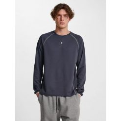 Dżersej z długim rękawem Hummel Pulse Performance. Brązowe koszulki męskie z długim rękawem HUMMEL, bez wzorów, z dżerseju, sportowe, bez kołnierzyka, bez ramiączek. Za 168.00 zł.