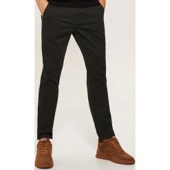 Spodnie typu chino - Khaki. Brązowe eleganckie spodnie męskie House. Za 99.99 zł.