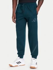 Adidas Spodnie dresowe Z.N.E. JW4724 Zielony Loose Fit. Zielone spodnie dresowe męskie ADIDAS, bez wzorów, z bawełny. Za 299.99 zł.
