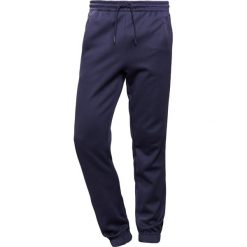 BOSS ATHLEISURE HADIKO Spodnie treningowe navy. Długie spodnie sportowe męskie marki BOSS ATHLEISURE. W wyprzedaży za 350.35 zł.