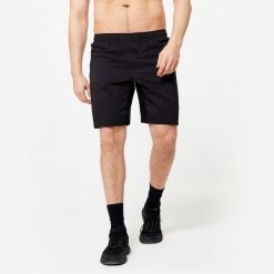 Spodenki fitness cardio męskie Domyos. Czarne szorty sportowe męskie DOMYOS, bez wzorów, z elastanu, sportowe. Za 49.99 zł.