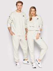 New Balance Spodnie dresowe Unisex UP21500 Szary Ahletic Fit. Szare spodnie dresowe męskie New Balance, bez wzorów, z dresówki. Za 239.99 zł.