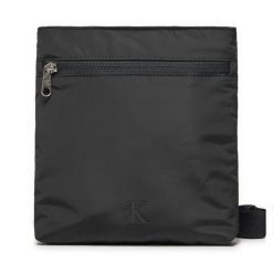 Saszetka Calvin Klein Jeans. Czarne saszetki męskie Calvin Klein Jeans, bez wzorów, z jeansu, młodzieżowe, małe. Za 139.99 zł.