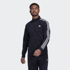 Kurtka z dresu adidas 3-Stripes Essentials Warm-Up. Białe kurtki męskie ADIDAS, l, bez wzorów, z dresówki, bez ramiączek, bez kaptura. W wyprzedaży za 209.85 zł.