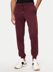Jack & Jones Spodnie dresowe Gordon 12258477 Bordowy Regular Fit. Czerwone spodnie dresowe męskie Jack & Jones, bez wzorów, z dresówki. Za 89.99 zł.