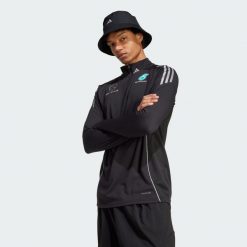Bluza Mercedes - Amg Petronas Formula One Team Mechanics. Czarne bluzy nierozpinane męskie ADIDAS, l, bez wzorów, z materiału, bez ramiączek, bez kaptura. W wyprzedaży za 359.25 zł.