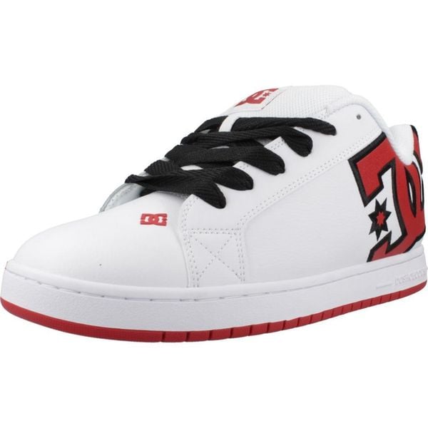 Kapcie DC COURT GRAFFIK M Biały. Białe buty trekkingowe męskie DC Shoes, bez wzorów, z tkaniny, bez zapięcia, trekkingowe. Za 369.99 zł.