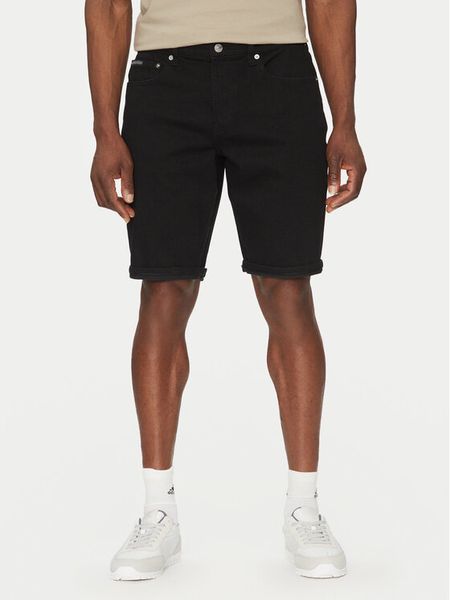 Calvin Klein Jeans Szorty jeansowe J30J327195 Czarny Regular Fit. Czarne szorty męskie Calvin Klein Jeans, bez wzorów, z bawełny. Za 189.99 zł.