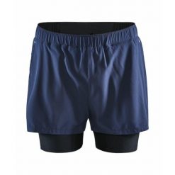 Szorty Craft 2-in-1 adv essence stretch. Niebieskie szorty sportowe męskie Craft, bez wzorów, sportowe. W wyprzedaży za 229.50 zł.