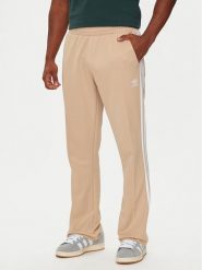 Adidas Spodnie dresowe adicolor 70's IX5221 Beżowy Regular Fit. Brązowe spodnie dresowe męskie ADIDAS, bez wzorów, z bawełny. Za 189.99 zł.