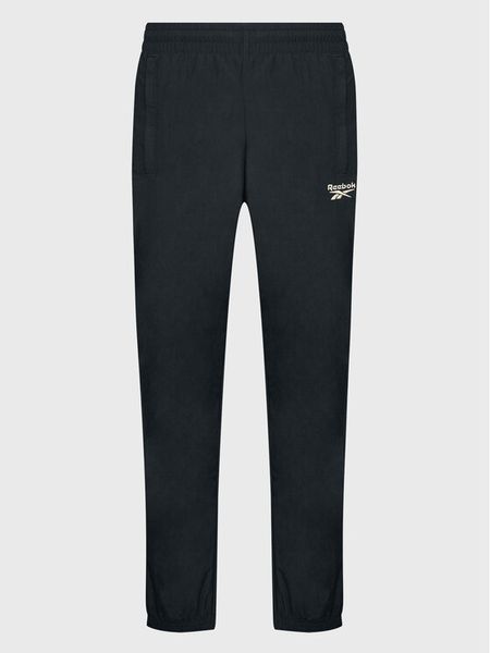 Reebok Spodnie dresowe Vector HK7077 Czarny Slim Fit. Czarne spodnie dresowe męskie Reebok, bez wzorów, z dresówki. Za 379.99 zł.