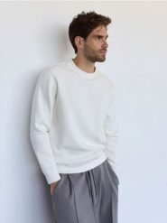 Gładka bluza z bawełną - złamana biel. Bluzy nierozpinane męskie Reserved, l, bez wzorów, z bawełny, bez ramiączek, bez kaptura. W wyprzedaży za 69.99 zł.