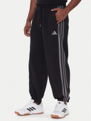 Adidas Spodnie dresowe Ess JM1703 Czarny Regular Fit. Czarne spodnie dresowe męskie ADIDAS, bez wzorów, z bawełny. Za 259.99 zł.