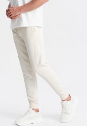 Ombre Bawełniane męskie dresowe spodnie joggery BASIC kremowe V5 OM-PABS-0174 XXL. Białe długie spodnie sportowe męskie Ombre, bez wzorów, z bawełny. Za 129.99 zł.