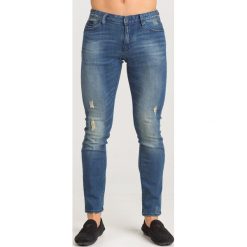 JEANSY Armani Exchange. Niebieskie jeansy męskie Armani Exchange, z aplikacjami, z bawełny. Za 356.30 zł.