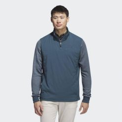 Kurtka Go-To Quarter-Zip. Niebieskie kurtki męskie ADIDAS, xs, bez wzorów, z materiału, sportowe, bez ramiączek, bez kaptura. W wyprzedaży za 268.50 zł.