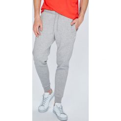 Adidas Originals - Spodnie. Długie spodnie sportowe męskie Adidas Originals. W wyprzedaży za 219.90 zł.