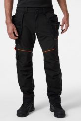 Helly Hansen Spodnie Robocze Helly Hansen Chelsea BRZ Black. Czarne długie spodnie sportowe męskie Helly Hansen, bez wzorów. Za 541.42 zł.