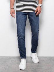 Ombre Spodnie męskie jeansowe z przetarciami REGULAR FIT - ciemnoniebieskie V4 OM-PADP-0102 L. Niebieskie długie spodnie sportowe męskie Ombre, bez wzorów, z jeansu. Za 99.99 zł.