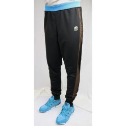 Adidas Adidas Rita Ora Loose S11806 czarne 34. Długie spodnie sportowe męskie marki ADIDAS. Za 106.12 zł.