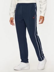 Ellesse Spodnie dresowe Inzagi SHX20959 Granatowy Regular Fit. Niebieskie spodnie dresowe męskie Ellesse, bez wzorów, z dresówki. Za 179.99 zł.