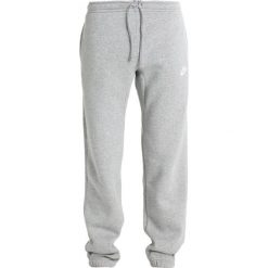 Nike Sportswear Spodnie treningowe dark grey heather/white. Długie spodnie sportowe męskie Nike Sportswear. Za 379.00 zł.