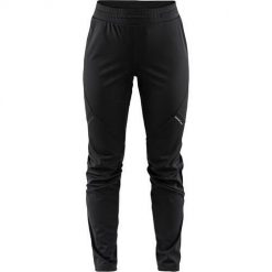 Spodnie treningowe męskie Craft Glide. Czarne długie spodnie sportowe męskie Craft, bez wzorów, z dresówki, na fitness i siłownię. Za 599.99 zł.