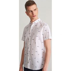 Koszula slim fit z drobnym wzorem - Wielobarwn. Koszule męskie marki Reserved. Za 89.99 zł.