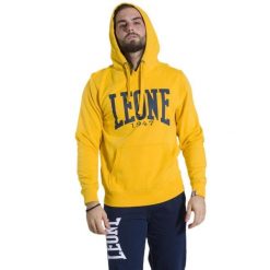 Męska bluza z kapturem Leone 1947 Apparel. Żółte bluzy nierozpinane męskie LEONE 1947 APPAREL, l, bez wzorów, z tkaniny, sportowe, bez ramiączek, z kapturem. W wyprzedaży za 139.75 zł.
