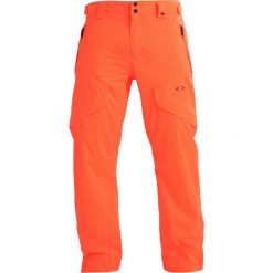 Oakley VERTIGO Spodnie narciarskie neon orange. Spodnie narciarskie i snowboardowe męskie marki Oakley. W wyprzedaży za 755.30 zł.