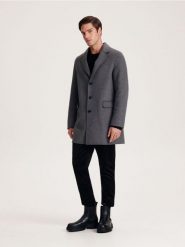 Skórzane botki za kostkę - czarny. Czarne sztyblety męskie Reserved, ze skóry, za kostkę, bez obcasa, bez zapięcia. W wyprzedaży za 139.99 zł.