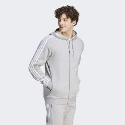 Bluza z kapturem Essentials Fleece 3-Stripes Full-Zip. Szare bluzy nierozpinane męskie ADIDAS, s, bez wzorów, z materiału, sportowe, bez ramiączek, z kapturem. Za 237.00 zł.