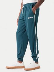 Guess Spodnie dresowe Z6RB13 KD482 Zielony Regular Fit. Zielone spodnie dresowe męskie Guess, z aplikacjami, z dresówki. Za 349.99 zł.