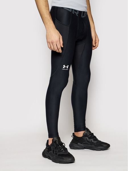 Under Armour Legginsy HeatGear® 1361586 Czarny Slim Fit. Czarne legginsy męskie Under Armour, m, bez wzorów, z syntetyku, do biegania. Za 139.00 zł.