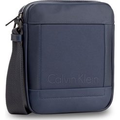 Saszetka CALVIN KLEIN - Caillou Repotrer K50K502885 422. Saszetki męskie marki Calvin Klein. W wyprzedaży za 239.00 zł.