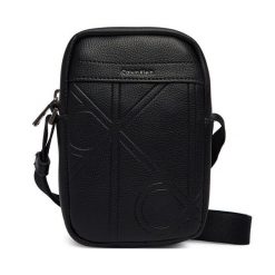 Saszetka Calvin Klein. Czarne saszetki męskie Calvin Klein, bez wzorów, małe. Za 329.99 zł.