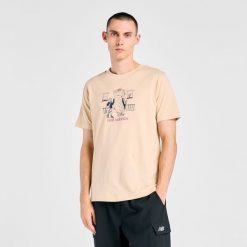 Koszulka męska New Balance MT61Y0XJABC – beżowa. Brązowe t-shirty sportowe męskie New Balance, l, bez wzorów, z bawełny, klasyczne, bez ramiączek. Za 109.99 zł.