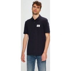 Calvin Klein Jeans - Polo. Czarne koszulki polo męskie Calvin Klein Jeans, z bawełny, polo, z krótkim rękawem. Za 269.90 zł.
