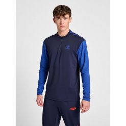 Bluza dresowa 1/2 zip Hummel Pro Grid. Niebieskie bluzy nierozpinane męskie HUMMEL, bez wzorów, z dresówki, eleganckie, bez ramiączek, bez kaptura. W wyprzedaży za 253.60 zł.
