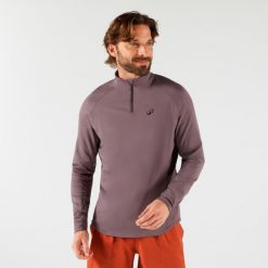 Bluza tenisowa termoaktywna męska Thermic na krótki suwak. Brązowe bielizna termoaktywna męska ARTENGO, m, bez wzorów, z elastanu, bez ramiączek, tenisowe. Za 89.99 zł.