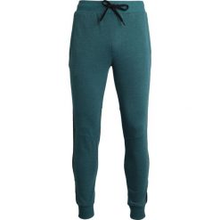 Under Armour Spodnie męskie THREADBORNE TERR JOGGER zielone r. XL (1310577-296). Długie spodnie sportowe męskie Under Armour. Za 219.41 zł.