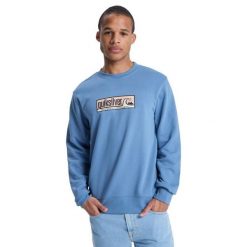 Bluza z okrągłym dekoltem dla Mężczyzn GRAPHIC Niebieski. Niebieskie bluzy nierozpinane męskie Quiksilver, m, bez wzorów, z bawełny, casualowe, bez ramiączek, bez kaptura. Za 269.99 zł.