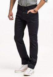 WRANGLER TEXAS SLIM MĘSKIE SPODNIE MATERIAŁOWE DARK NAVY W12SEAXAE 112330702. Niebieskie spodnie na co dzień męskie Wrangler, bez wzorów, z jeansu. Za 229.99 zł.