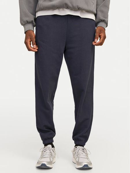 Jack & Jones Spodnie dresowe Morgan 12257964 Granatowy Regular Fit. Niebieskie spodnie dresowe męskie Jack & Jones, bez wzorów, z bawełny. Za 119.99 zł.