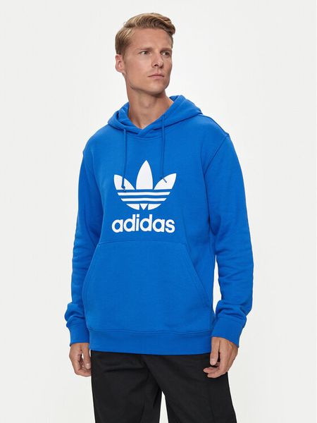 Adidas Bluza adicolor Classics Trefoil IZ1855 Niebieski Regular Fit. Niebieskie bluzy nierozpinane męskie ADIDAS, m, bez wzorów, z bawełny, bez ramiączek, bez kaptura. Za 189.99 zł.