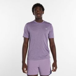 Koszulka męska New Balance MT41253AB7 – fioletowa. Fioletowe t-shirty sportowe męskie New Balance, l, bez wzorów, z materiału, sportowe, bez ramiączek. Za 199.99 zł.