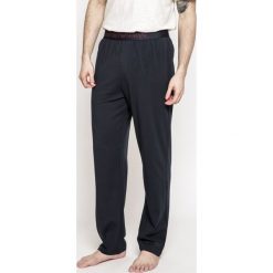 Emporio Armani - Spodnie. Długie spodnie sportowe męskie marki Emporio Armani. W wyprzedaży za 119.90 zł.