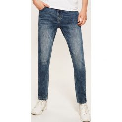 Jeansy slim fit - Niebieski. Niebieskie jeansy męskie House, z jeansu. Za 129.99 zł.