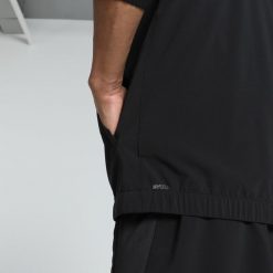 Męska kurtka do biegania VELOCITY PUMA Black. Czarne kurtki męskie Puma, m, bez wzorów, sportowe, bez ramiączek, bez kaptura. Za 260.00 zł.